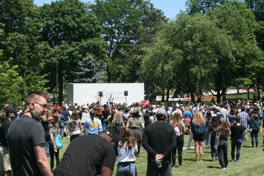 An Elmhurst March for Equality organizer speaks to protesters in Wilder Park about the term positionality and its relation to the common phrase white privilege.  June 13, 2020.