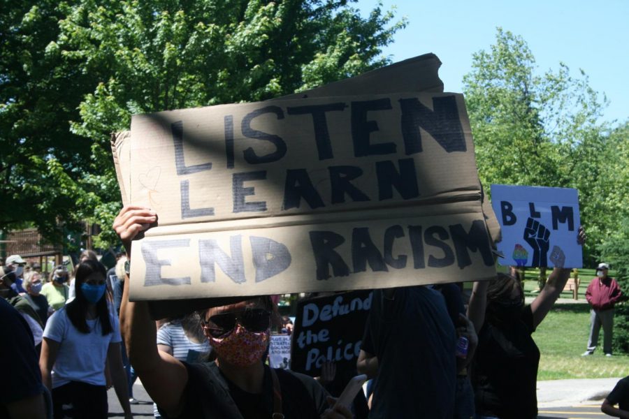 At the Elmhurst March for Equality, any protesters created signs based on phrases seen across social media in support of the movement. June 13, 2020.