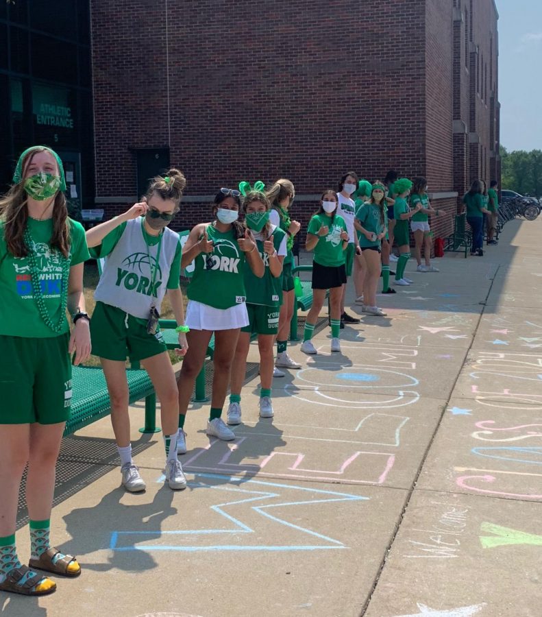 Upperclassmen prepare to greet freshmen on their first day. While the 2020-21 school year began remotely, the freshmen class arrived in person for their first day. Aug. 24, 2020.