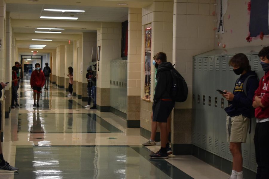 York sophomores join the freshmen for hybrid learning. In the the World Language hallway, students waited to enter their classrooms before school began. Sept. 28, 2020.
