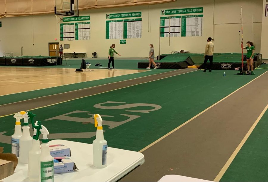 Yorks Girls Track and Field Team is adjusting to the restrictions of both COVID-19 and rainy spring weather by practicing indoors, making sure to social distance and sanitizing all of their equipment. 