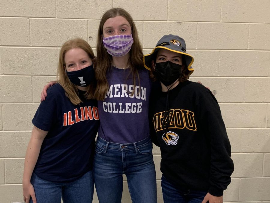 Olivia Rosenbger, CeCe Lampa and Lucy Valeski take a break during yearbook distribution to celebrate Decision Day.  May 3, 2021.