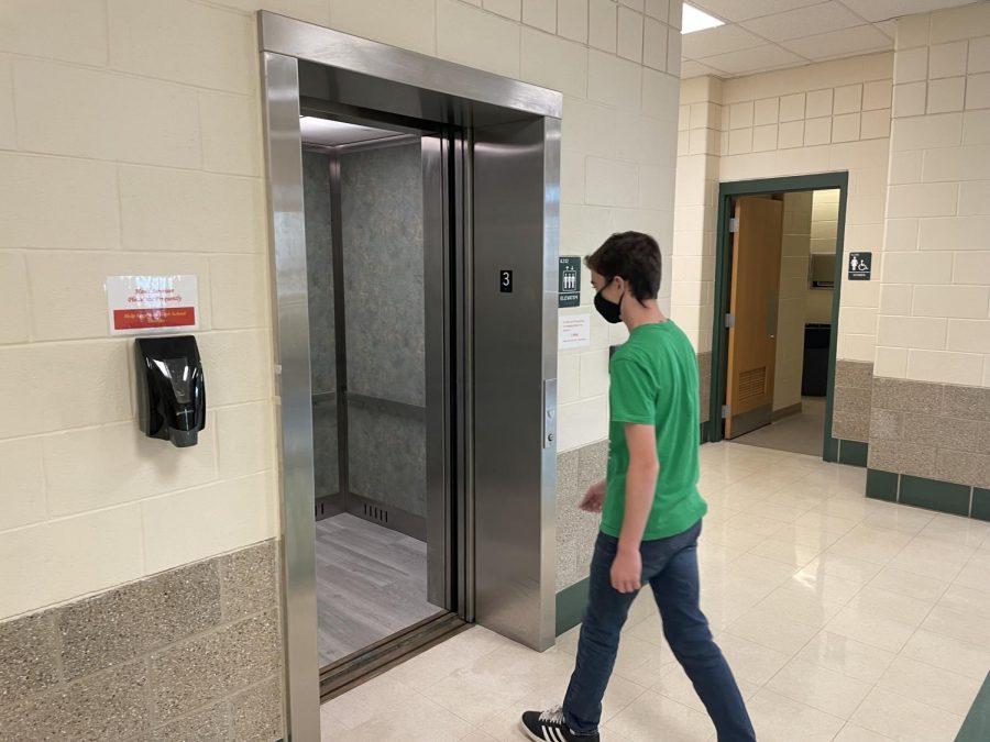 York student heads into a school elevator, unaware of danger within.