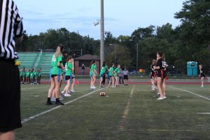 Juniors and seniors get prepared for to play in the 2019 flag football game.
