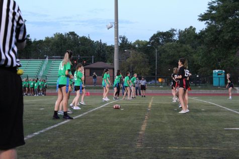 Juniors and seniors get prepared for to play in the 2019 flag football game.
