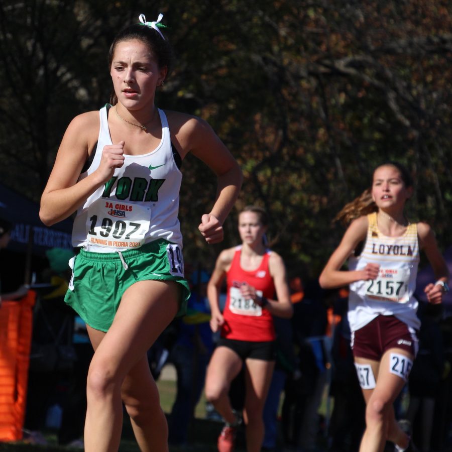 Senior Allison Fitzgibbons speeds past her opponents towards the finish November 6th, 2021