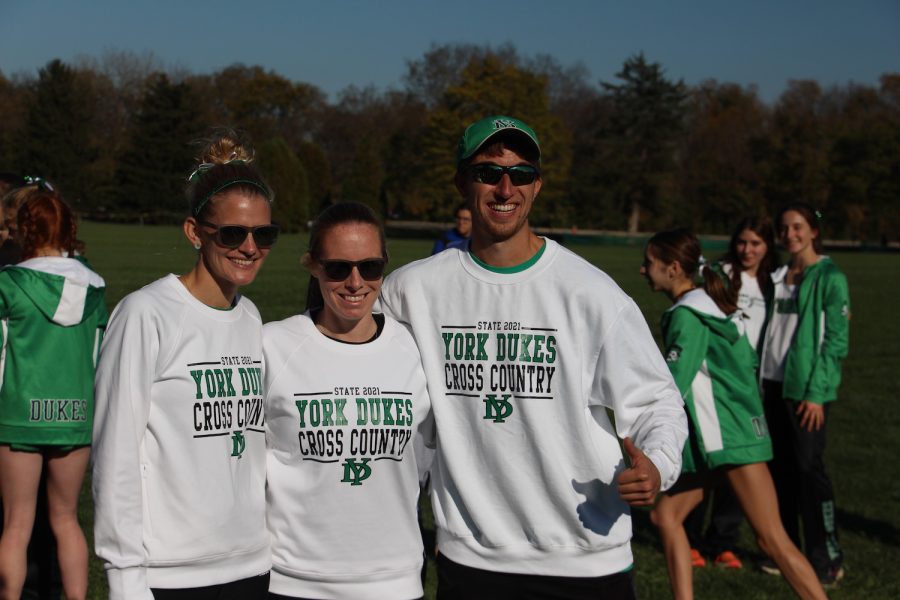 Team coaches Ashley Tucker, Lauren DeAngelis, and Jimmy Kolb (Left to Right) pose for a picture after the girls race  November 6th, 2021