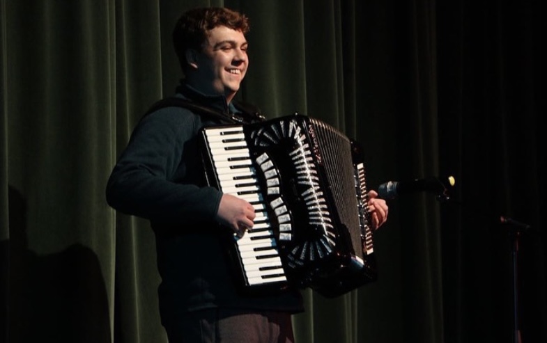 Senior Jack Pals performs the accordion during York Live A of Fine Arts Week. Photo by Kathryn Castanoli. 
