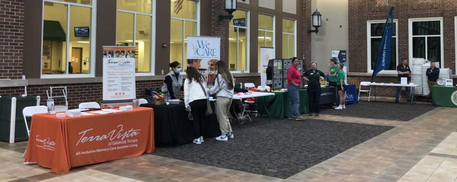 A set of booths showing off the job opportunities for students 