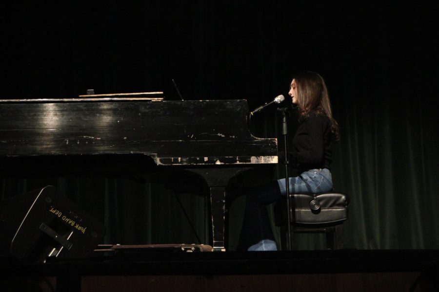 Junior Marissa Failla performs an original song, The Way I Feel on the piano. 