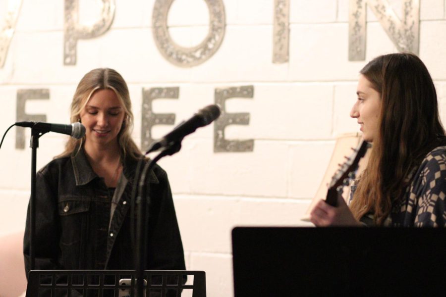 Seniors Avery Kendrick and Alyssa Poli perform during the Brewpoint Craft show. 