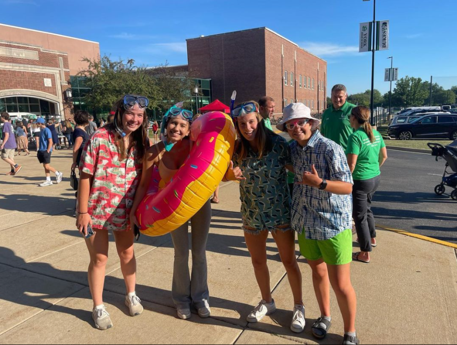 The Scuba Dukes welcome students at the Back to School Bash. Pictured from left to right, Emily Daly, Viviana Morales, Maddie Saltiel, Kathryn Castanoli. Photo courtesy of the @scuba_dukes on Instagram.