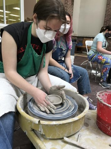 Graduates make clay art at last years art fair during Fine Arts Week. Photo courtesy of Renee Kuharchuk.
