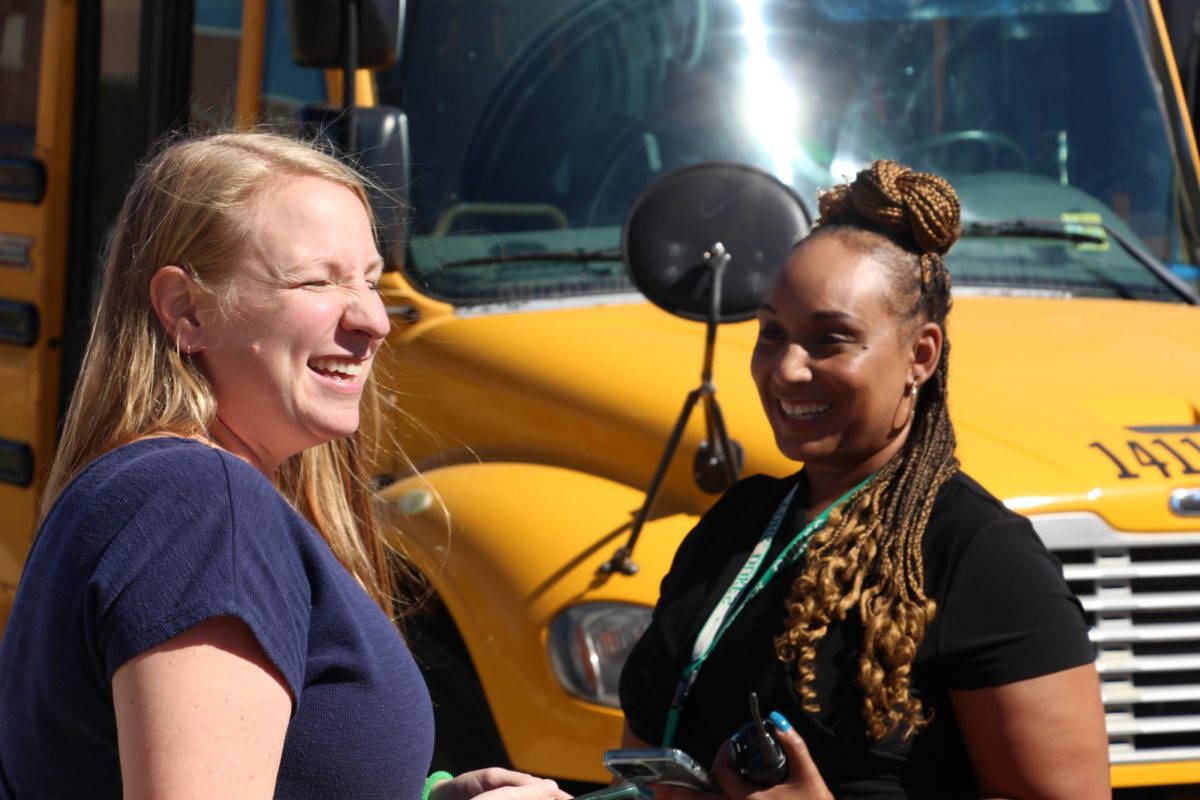 Hurt chats with Dean Tonja Killingham  outside of York during the daily bus send-off.
