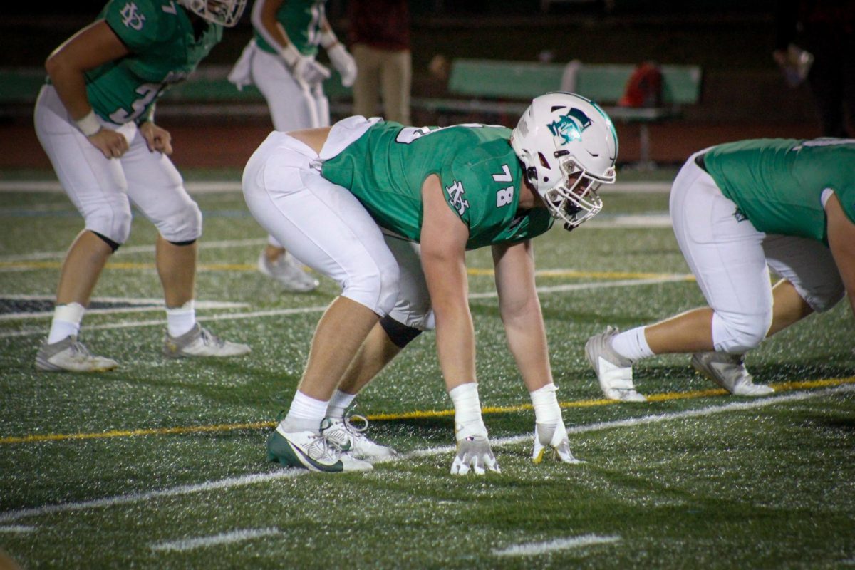 Joseph Reiff gets into position in the Friday night game against Hinsdale Central.